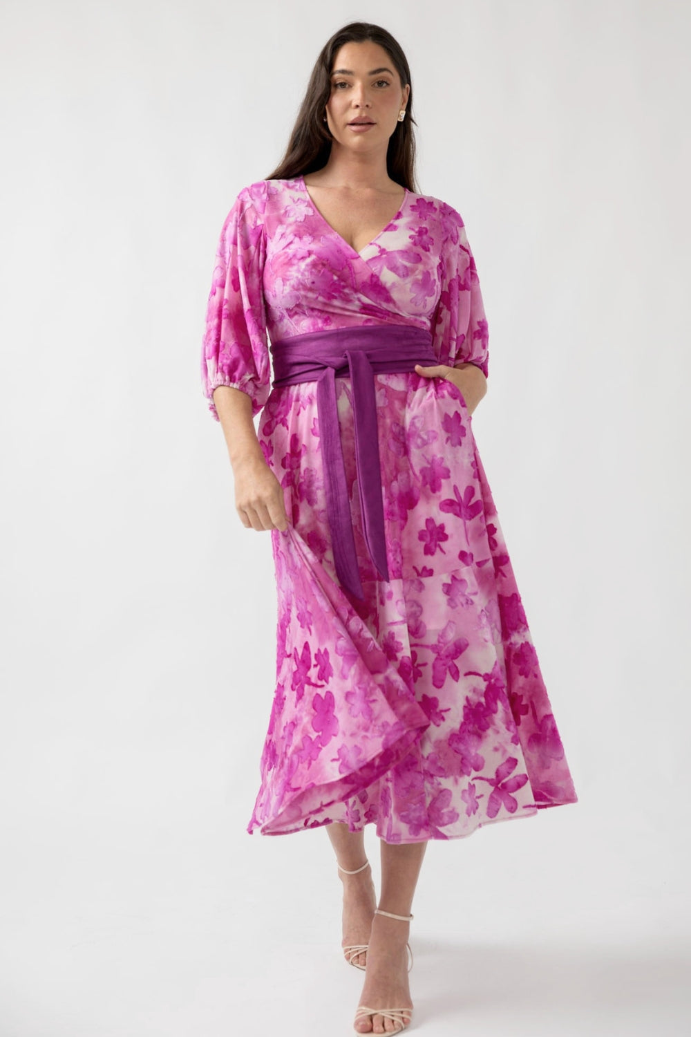 Australian-made Helena Dress featuring a feminine V-neck wrap silhouette, soft stretch burnout fabric and ruffle hem, available in Regular and Petite styles.