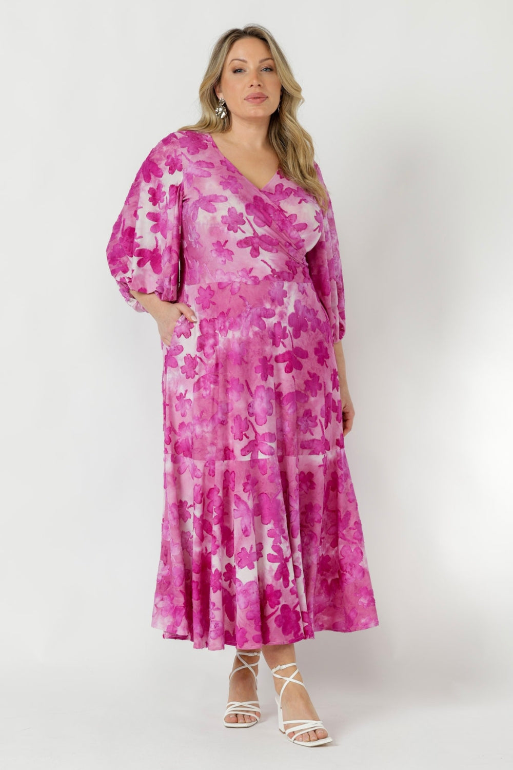 Australian-made Helena Dress featuring luxe burnout fabric, a flattering wrap-front silhouette and flowing ruffle hem, designed in Regular and Petite styles for sizes 8–24.