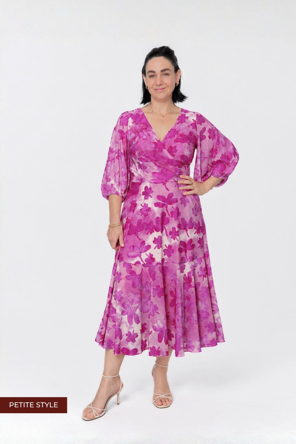 Elegant Helena Dress with a fixed wrap V-neckline, statement lantern sleeves and feminine ruffle hem, available in Regular and Petite fits in sizes 8–24.