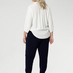 These chic 7/8 length pants feature single inside seam legs, a tapered fit, and ankle cuffs with a tuck detail, offering a sleek, modern silhouette. The Indi is the ultimate travel pant, so comfortable that you’ll want more than one pair. Perfectly versatile, it pairs effortlessly with our blazers for a seamless transition from weekend to work. Available in two different heights, designed for both plus-size and petite women.