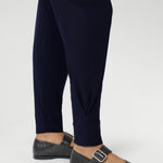 These stylish 7/8 length pants feature single inside seam legs, a tapered leg fit, and ankle cuffs with a tuck detail for a sleek, modern look.