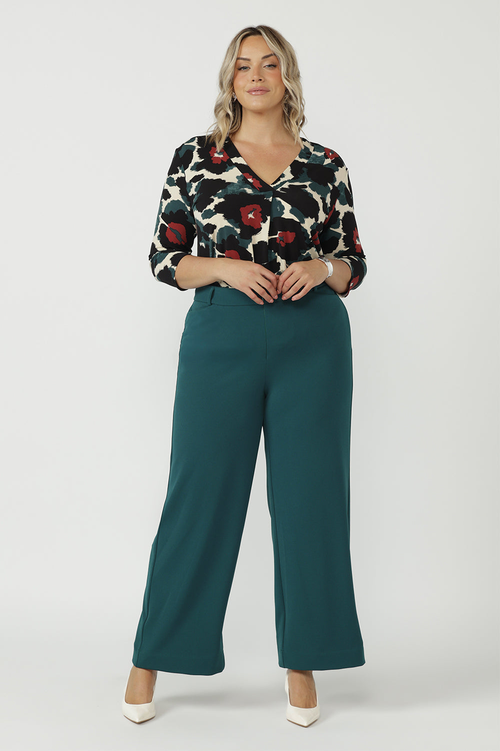 Australian-made Jaime Top featuring a collarless tailored design, centre-front tuck, 3/4 sleeves and premium dry-touch stretch jersey fabrication.