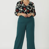 Australian-made Jaime Top featuring a collarless tailored design, centre-front tuck, 3/4 sleeves and premium dry-touch stretch jersey fabrication.