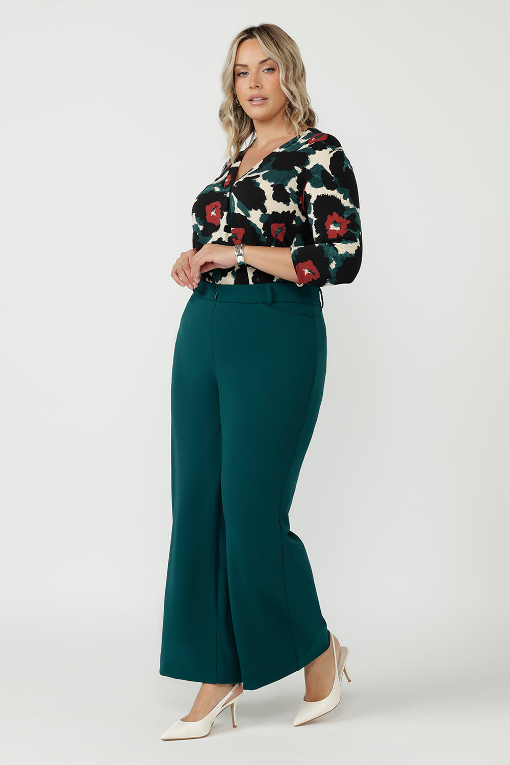 Elegant Jaime Top crafted from luxe dry-touch jersey with soft stretch, featuring a shoulder yoke, tailored back tuck and flattering curved hemline.