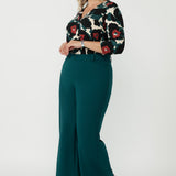 Elegant Jaime Top crafted from luxe dry-touch jersey with soft stretch, featuring a shoulder yoke, tailored back tuck and flattering curved hemline.