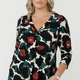 Women’s Jaime Top in soft stretch jersey with a flattering V-neck, relaxed tailored silhouette and curved shirttail hem for effortless work-to-weekend style.