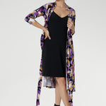 For added coverage or a smooth layered finish, style it with the Myah Slip underneath—perfect for achieving a sleek silhouette, especially in the office or at more formal events. Thoughtful design features like the interlined collar, double-layer back bodice, ¾ sleeves, and knee-length skirt ensure a polished, all-day look. 