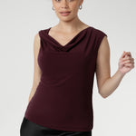 Crafted from a luxurious heavy-weight Lyocell knit fabric that feels silky to the touch and offers a rich, elegant appearance, the Jordan Top in Wine is designed for versatile, stylish wear. This reversible piece allows you to switch effortlessly between two distinct looks.