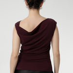 Crafted from a luxurious heavy-weight Lyocell knit fabric that feels silky to the touch and offers a rich, elegant appearance, the Jordan Top in Wine is designed for versatile, stylish wear. 