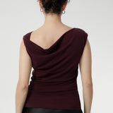 Crafted from a luxurious heavy-weight Lyocell knit fabric that feels silky to the touch and offers a rich, elegant appearance, the Jordan Top in Wine is designed for versatile, stylish wear. 