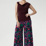 The Jordan Top ensures both comfort and structure. Proudly designed and made in Australia, it embodies high-quality craftsmanship and timeless versatility. Size 10 model wears her reversible top with printed culottes and chunky black sandals.