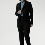 Introducing the Kean high turtleneck top from the Light Layers collection, a stylish and functional piece designed to elevate your wardrobe as the seasons cool. This long-sleeved top features convenient thumb holes for added comfort and warmth. Made from a blend of stretchy Tencel wool fabric, it offers both flexibility and coziness, making it the perfect layering piece for cooler weather.