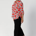 Although the fabric has no stretch, its exceptional drape creates a flattering silhouette that moves with you. Size 12 woman wears V-neckline top with a tailored tuck at the centre front, which adds subtle structure while maintaining the relaxed vibe of the top. The small collar stand with a luxe cross-over detail at the back neckline brings a refined, elegant touch to the design.