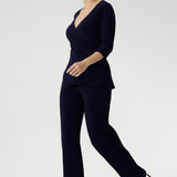 The Kyle Top is the perfect blend of professional polish and all-day comfort, making it a versatile addition to any modern wardrobe. Designed with a fixed wrap bodice that stays perfectly in place, this top offers the elegance of a wrap style without the need for constant adjustment. 