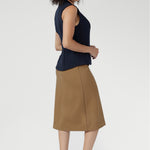 Designed to transition seamlessly through the seasons. The Landry Skirt pairs perfectly with the matching Zander Jacket for a modern take on polished suiting.