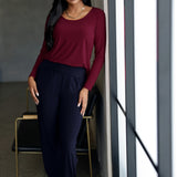 The Leith Top in Ruby is the long-sleeve evolution of our beloved Jules Top, designed for ultimate comfort and layering ease. Perfect as a standalone piece or worn under jackets and knitwear, this fitted women’s top is a must-have staple for cooler days and transitional weather. Proudly Australian made and available in sizes 8 to 24, it’s crafted from a soft-stretch, dry-touch jersey that feels as good as it looks.