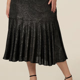 A midi length, foil print evening skirt with ruffle hem in plus size. For cocktail and evening wear, this elegant skirt is made in Australia by women's fashion brand, Leina & Fleur. Shop their evening and cocktail wear online in sizes 8 to 24.