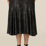Back view of a midi length, foil print evening skirt with ruffle hem in plus size. For cocktail and evening wear, this elegant skirt is made in Australia by women's fashion brand, Leina & Fleur. Shop their evening and cocktail wear online in sizes 8 to 24.