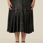 Close up of a midi length, foil print evening skirt with ruffle hem. An elegant skirt for cocktail and evening wear, this below-the-knee skirt is made in Australia by women's fashion brand, Leina & Fleur. Shop their evening and cocktail wear online in petite to plus sizes.