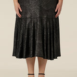 Close up of a midi length, foil print evening skirt with ruffle hem. An elegant skirt for cocktail and evening wear, this below-the-knee skirt is made in Australia by women's fashion brand, Leina & Fleur. Shop their evening and cocktail wear online in petite to plus sizes.