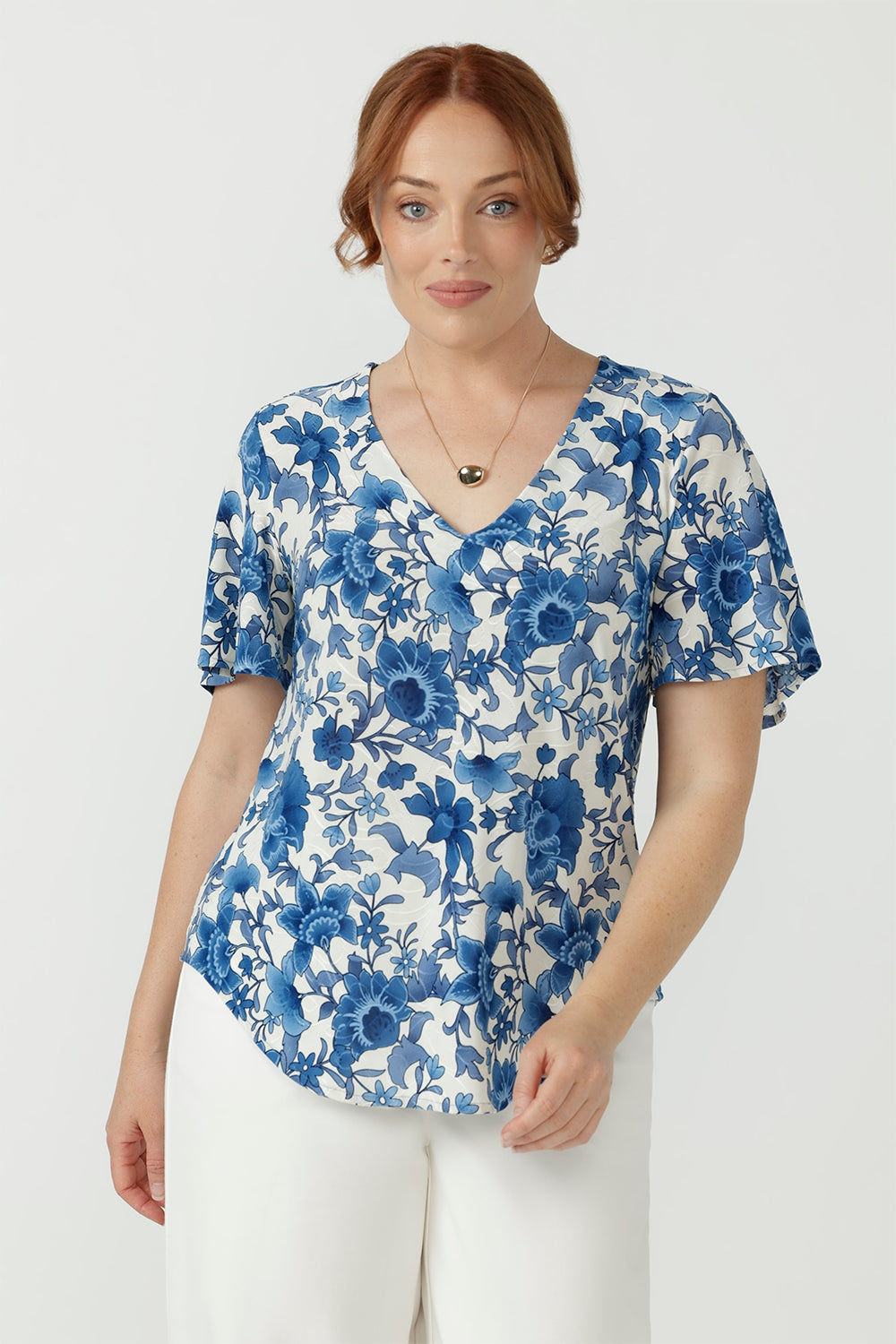 Lila Top in luxe embroidered jersey, featuring a flattering V-neckline, soft flutter sleeves and a relaxed slim-fit silhouette.