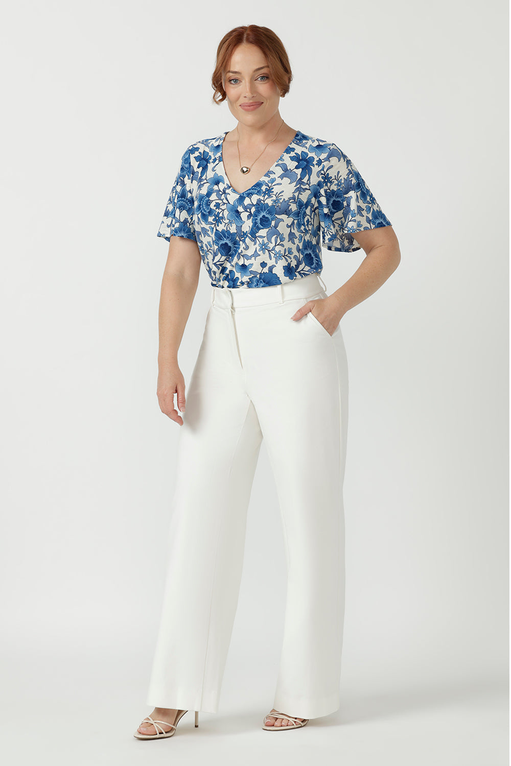 Versatile Australian-made Lila Top featuring soft stretch fabric, delicate embroidered detailing and flutter sleeves that gently cover the upper arms.