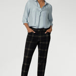 The Lulu Pant, a contemporary take on classic tailoring. With a mid-rise fit, slim tapered leg, and ankle-length finish, the Lulu brings a sleek, modern edge to both workwear and smart-casual styling. The tailored waistband features a fly fastening with a hook and bar closure for a clean front, while angled front pockets, back darts, and belt loops complete the look with refined detail.