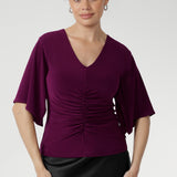 Crafted from our signature dry-touch stretch jersey, the Luna Top is designed with professional style and all-day comfort in mind, featuring handkerchief sleeves, and a stylish V-neckline that adds sophistication.