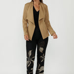 Gilded Noir Pant crafted from luxe winter-weight jacquard knit with soft stretch, featuring a textured black base with elegant toffee and cream print detailing and a flattering bootcut silhouette.