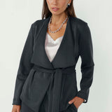 Designed with a flattering wrap silhouette, the Lyndon Jacket can be worn open or cinched at the waist with its coordinating tie.