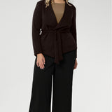 It can be worn open for a relaxed, effortless look, or cinched at the waist with its detachable tie belt for a more structured feel. Designed to sit just below the waist with a slightly longer front, the Lyndon Jacket complements both dresses and separates with ease.