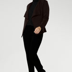 Australian made and thoughtfully designed for modern versatility. Crafted from a luxe Modal stretch fabric, this easy-care piece offers both warmth and elegance—perfect for layering during the cooler months. The Lyndon features a flattering wrap-style silhouette with angled front panels that drape beautifully, and tailored darts at the back to enhance shape.