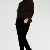 Australian made and thoughtfully designed for modern versatility. Crafted from a luxe Modal stretch fabric, this easy-care piece offers both warmth and elegance—perfect for layering during the cooler months. The Lyndon features a flattering wrap-style silhouette with angled front panels that drape beautifully, and tailored darts at the back to enhance shape.