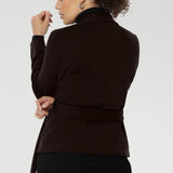 The Lyndon features a flattering wrap-style silhouette with angled front panels that drape beautifully, and tailored darts at the back to enhance shape. 