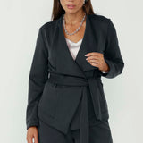 The Lyndon Jacket features detachable waist ties and a below-waist length for a polished, modern silhouette