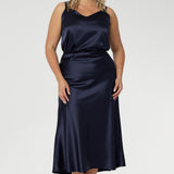 With a pull-on elastic waist, A-line shape, and soft stretch satin finish, it’s designed for all-day wear and effortless styling.