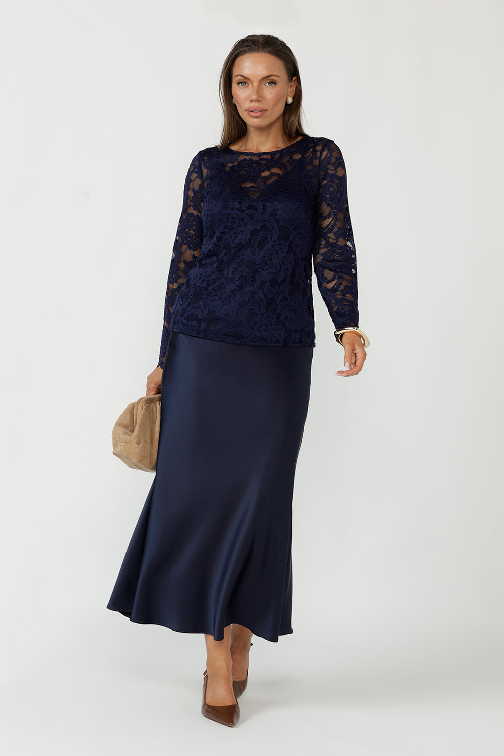 Featuring a flattering bias cut and elastic waist, it offers effortless, comfortable styling from day to night in sizes 8-24.