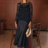 The Manhattan Maxi Skirt is a refined essential for women’s workwear Australia and occasion dressing, crafted from luxurious stretch satin with a soft sheen. 