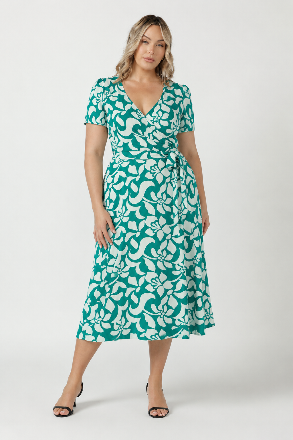 Timeless wrap dress in signature dry-touch jersey, designed with extended waist ties, a flowing A-line skirt and soft stretch fabric for effortless comfort.