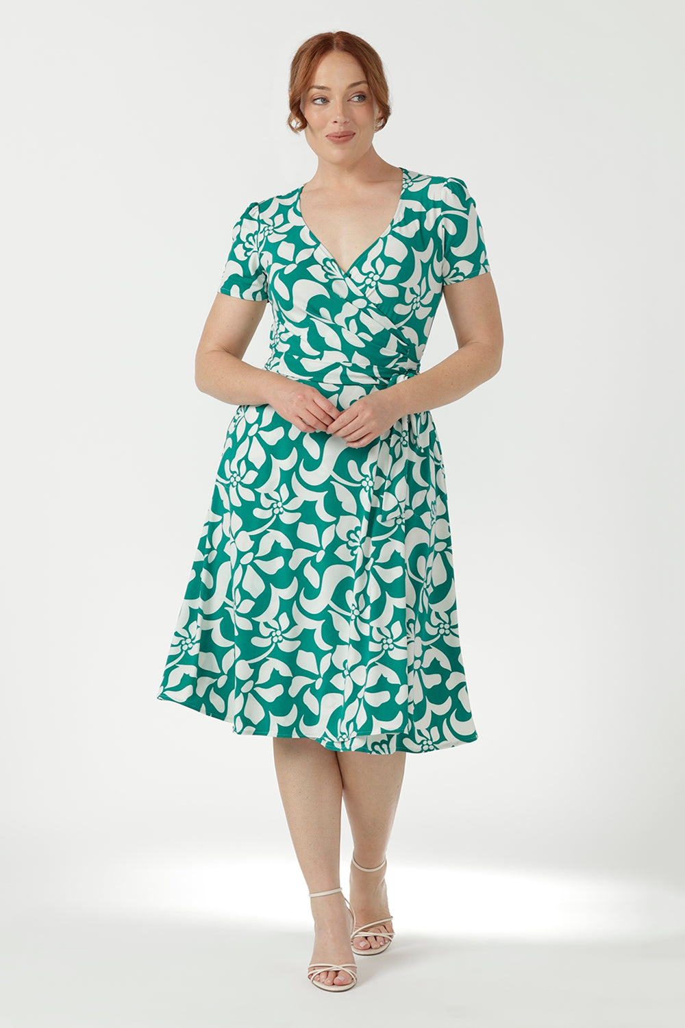 Flattering women's wrap dress featuring a functioning wrap bodice, adjustable waist ties, softly gathered sleeve heads and a graceful A-line skirt.