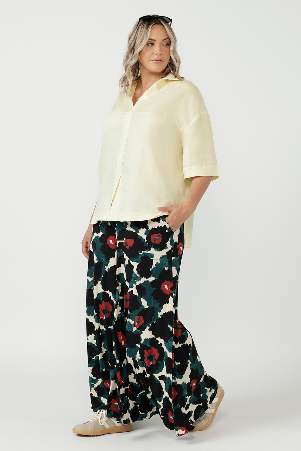 Elegant Caspian Palazzo Pant with a relaxed wide-leg silhouette, mid-rise pull-on waist and lightweight stretch jersey fabrication ideal for travel.