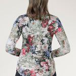  Its chic boat neckline and streamlined silhouette make it a polished, effortless wardrobe staple.
