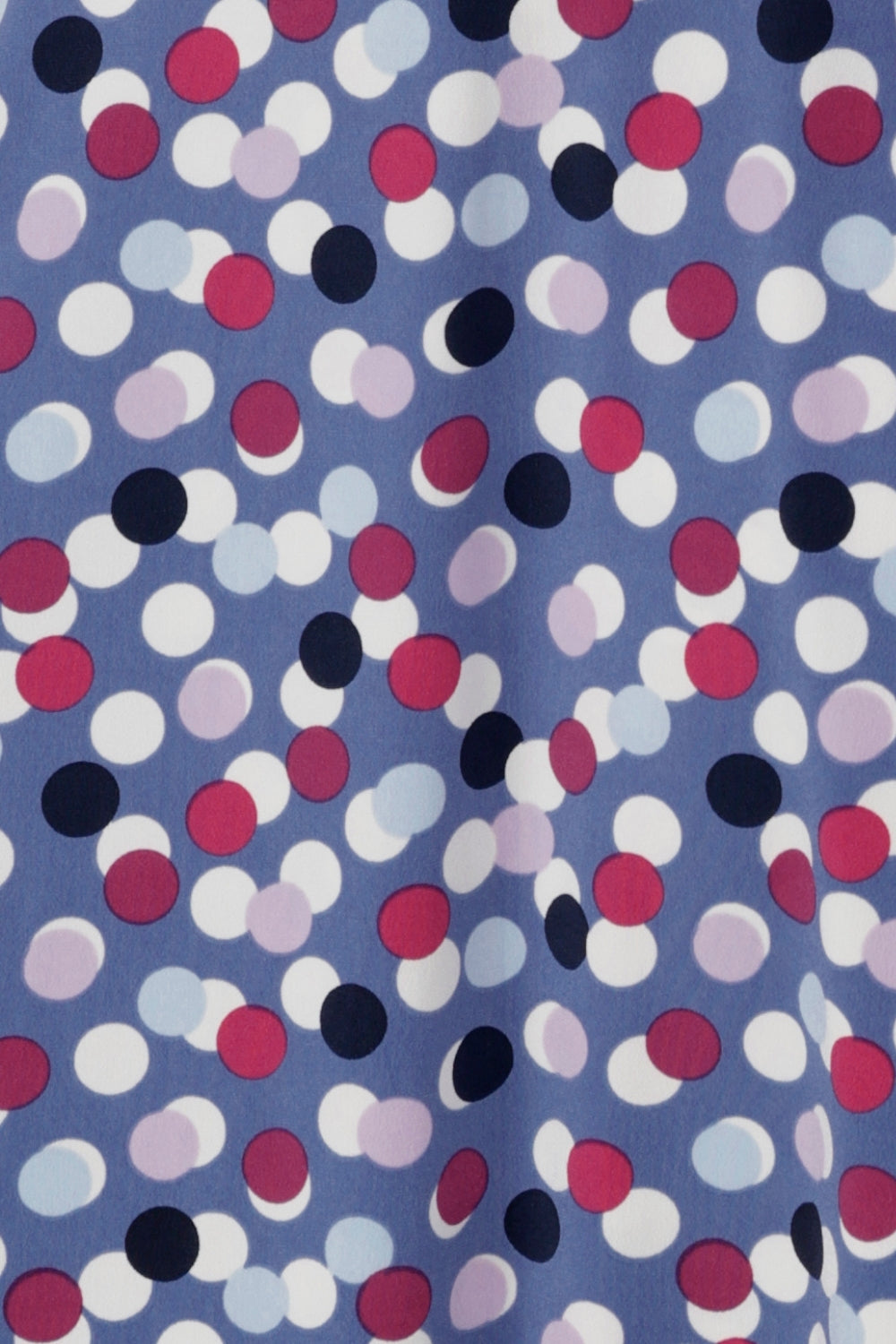 Swatch of Mauve Bubbles fabric print, made to craft a collection of women's dresses and tops all in Australia from stretchy jersey fabric.