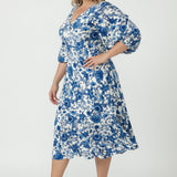 Australian-made Melina Dress featuring a feminine twist-front bodice, statement lantern sleeves with elasticated cuffs and a beautifully flowing skirt.