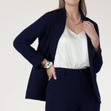  Perfect for work, Merit features a button front, full-length sleeves with foldable cuffs, and an extended shawl collar, offering versatile style and comfort.