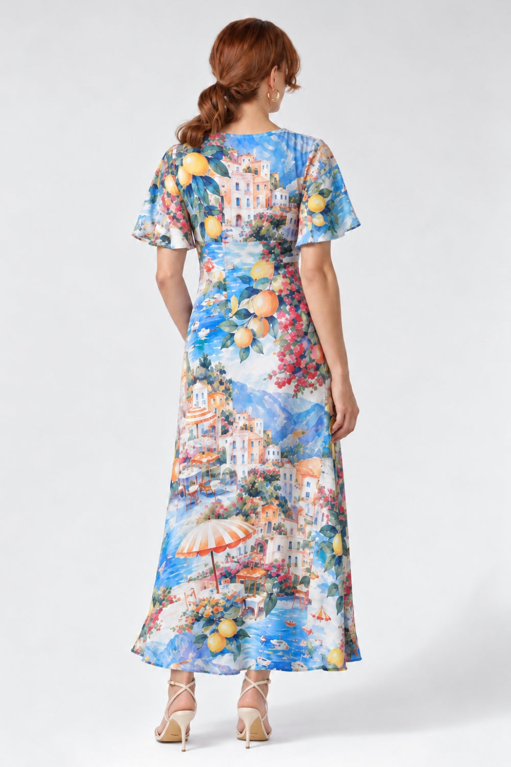 Discover the limited-edition Mica Maxi Dress in Limoncello, featuring a vibrant Italian-inspired print, flattering twist V-neck and flowing silhouette. Australian-made elegance for weddings and special occasions. Available in sizes 8-24 for a limited time only.