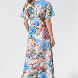 Discover the limited-edition Mica Maxi Dress in Limoncello, featuring a vibrant Italian-inspired print, flattering twist V-neck and flowing silhouette. Australian-made elegance for weddings and special occasions. Available in sizes 8-24 for a limited time only.