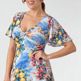 Discover the limited-edition Mica Maxi Dress in Limoncello, featuring a vibrant Italian-inspired print, flattering twist V-neck and flowing silhouette. Australian-made elegance for weddings and special occasions. Available in sizes 8-24 for a limited time only.