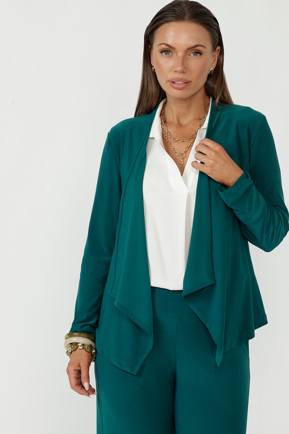 Mikey soft suiting cardigan with a chic waterfall collar, full-length sleeves and angled hemline, designed for versatile layering and modern sophistication.
