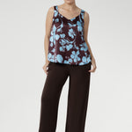Our signature Monroe Pant is loved for its luxe drape and easy wear. Made from heavy-weight dry-touch stretch jersey, it features a pull-on waist, deep double waistband, side pockets, and a straight-leg silhouette with a deep hem. Designed for comfort and versatility, it’s available in three lengths, sizes 8–24, and pairs effortlessly with our fluid suiting pieces.